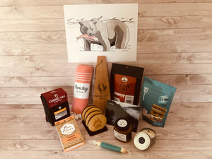 Cedar Grill Scraper, Coffee Okanagan Gold Whole Bean, Claire Watson Bear 8”x10” Print, Maple Candied Salmon Jerky, Bear Paw Wooden coaster set, Apricot Habanero Jam, Pixie Chicks 5 Star Salmon Rub, Turkish Towel, Saltwater Taffy, Toffee SMORE, Candles West Coast scent, The Grizzly themed personalized card